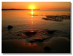 This photo was taken by Iain of the sunrise on Tong Beach on the Isle of Lewis.